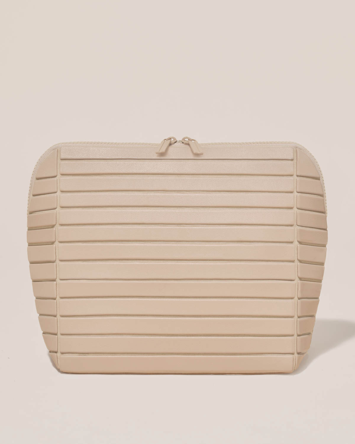 Closed Parallelle Large Bisque (white) Traveller makeup bag with structured horizontal bar design