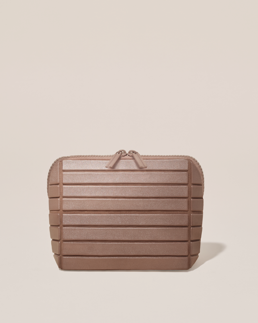 Closed Parallelle Small Bronze  Traveller makeup bag with structured horizontal bar design
