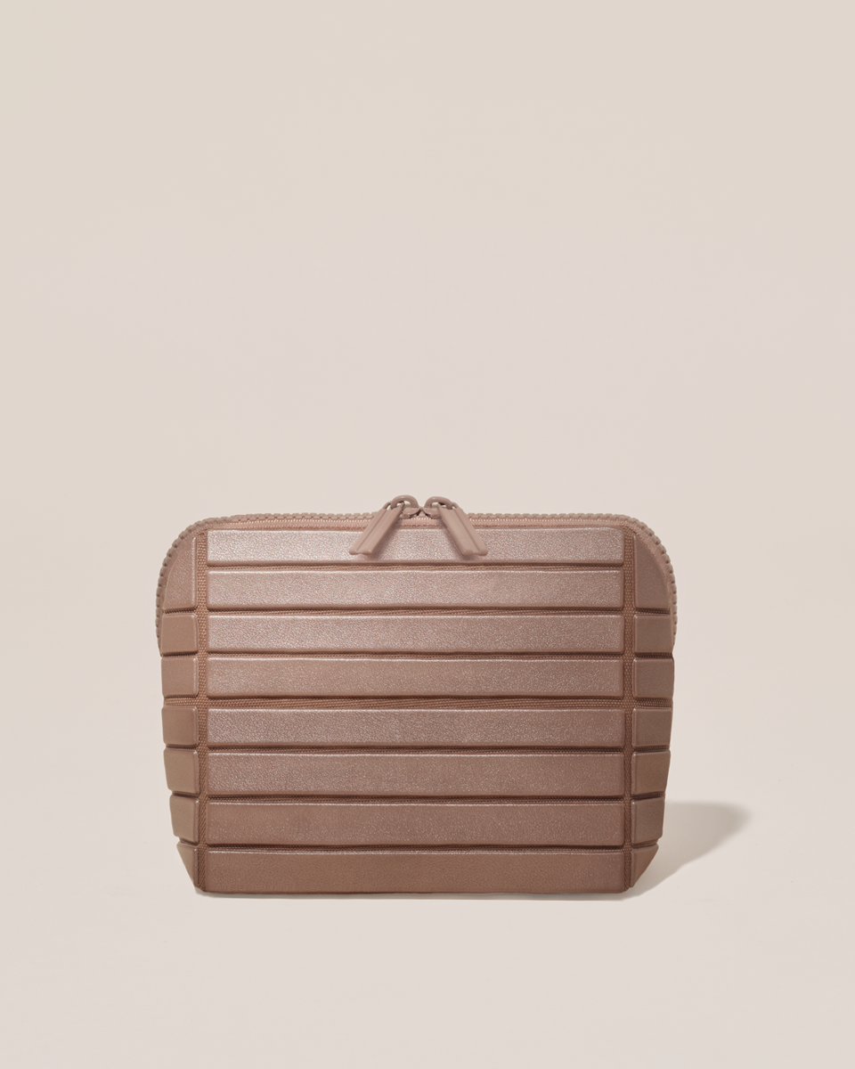 Closed Parallelle Small Bronze  Traveller makeup bag with structured horizontal bar design